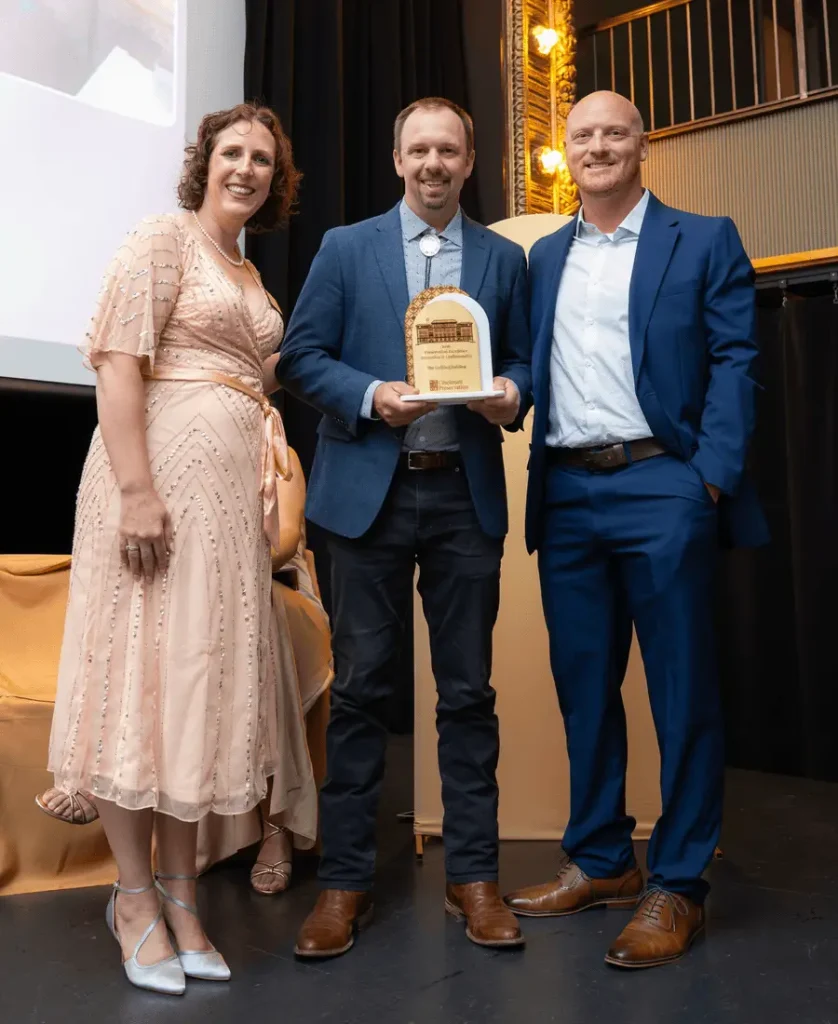 Henry Mitchell, President HKC Roofing & Sheet Metal, Conor McGeehan, Chief Operating Officer HKC Roofing & Sheet Metal and Cincinnati Preservation Executive Director, Beth Johnson.